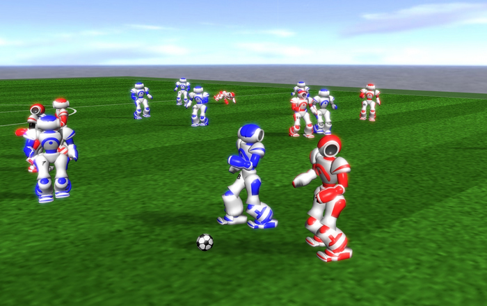 Grafik zeigt fußballspielende Roboter auf einem Spielfeld